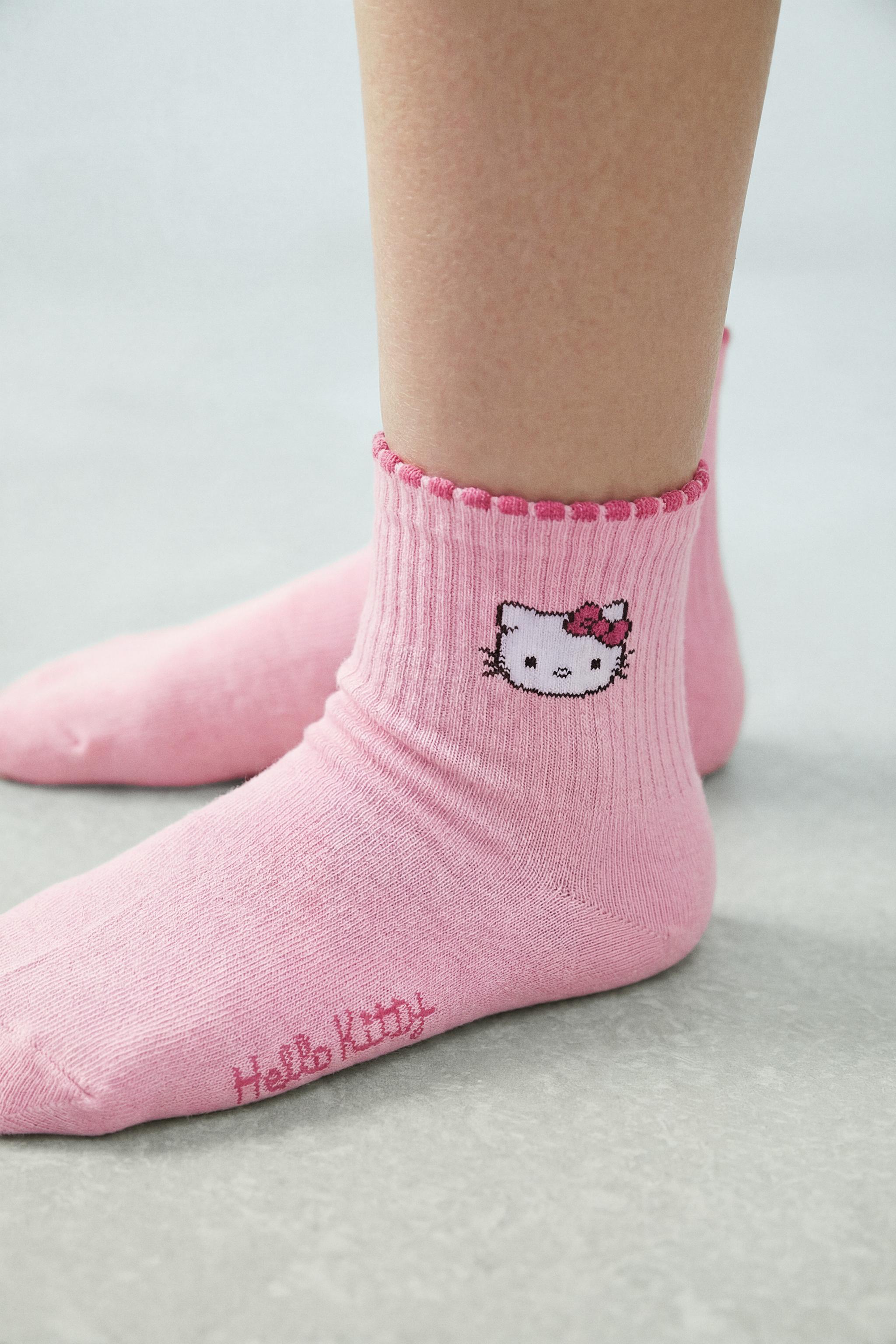 THREE-PACK OF HELLO KITTY AND FRIENDS © SANRIO MID-CALF SOCKS